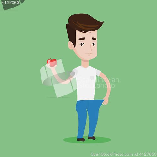 Image of Slim man in pants showing the results of his diet.