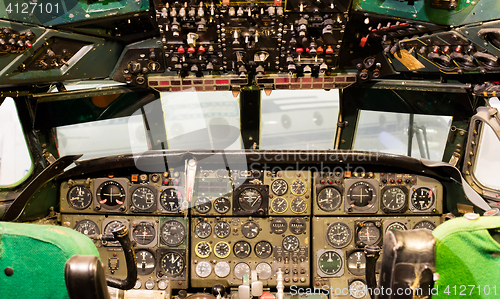 Image of Center console and throttles in airplane