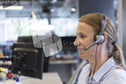 Image of female support phone operator