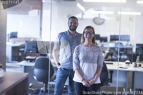 Image of business couple at office