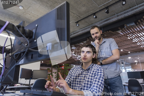 Image of startup business people group working as team to find solution