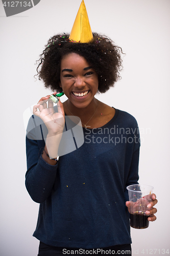 Image of happy young woman celebrating