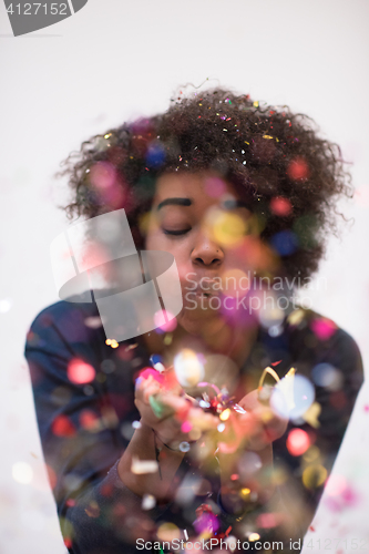 Image of happy young woman celebrating