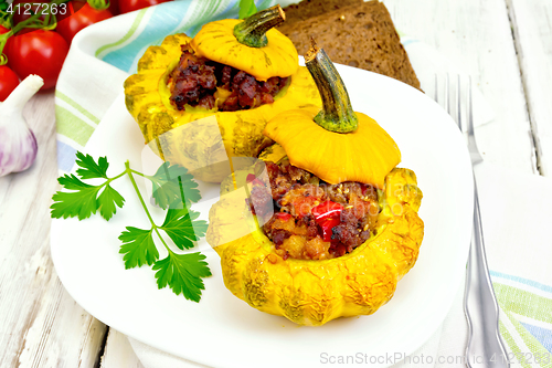 Image of Squash yellow stuffed in plate on light board