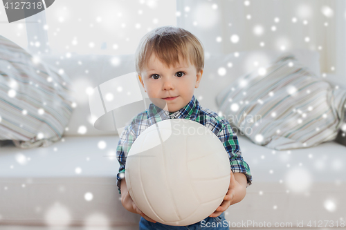 Image of happy little baby boy with ball at home