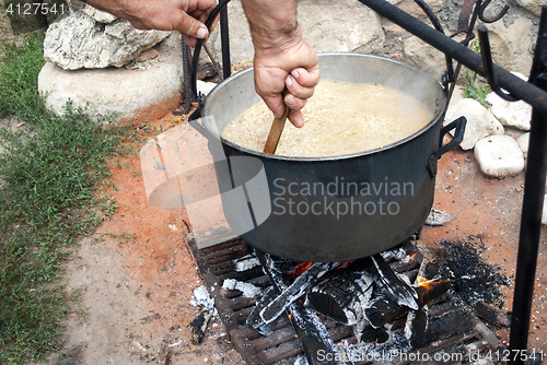 Image of a bowler on the fire