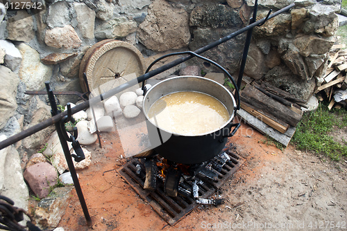 Image of bowler on the fire