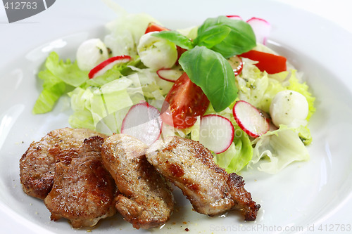 Image of Pork steak with vegetable salad