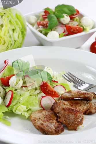 Image of Pork steak with vegetable salad
