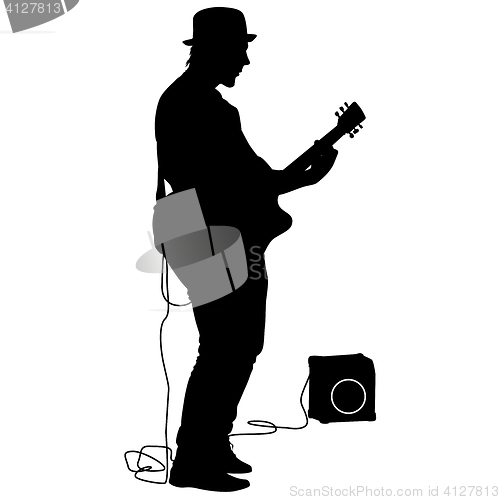 Image of Silhouette musician plays the guitar.