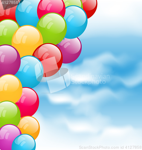 Image of Flying colourful balloons in blue sky