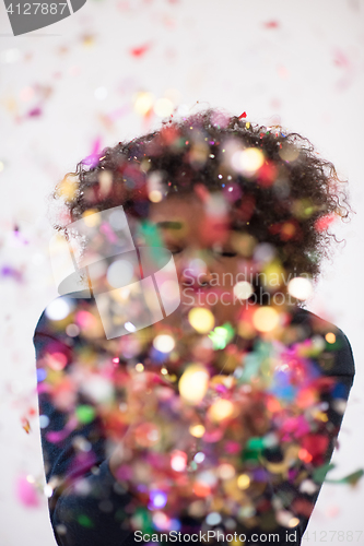 Image of happy young woman celebrating