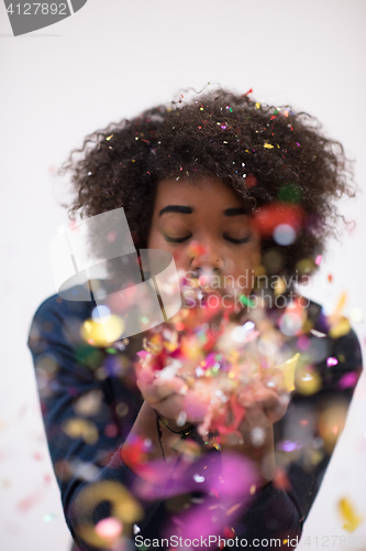 Image of happy young woman celebrating