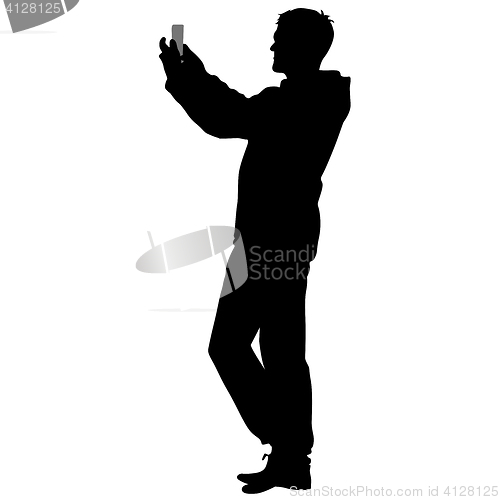 Image of Silhouettes man taking selfie with smartphone on white background.