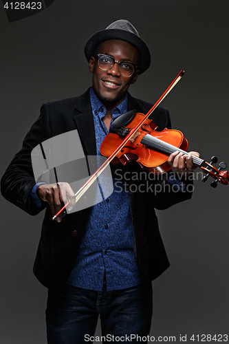 Image of The black man happy expression and music instrument