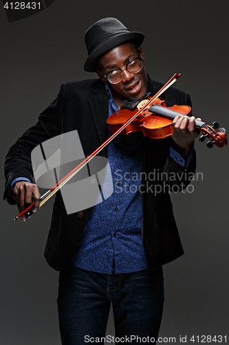 Image of The black man happy expression and music instrument