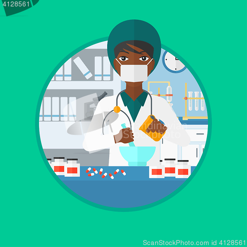 Image of Pharmacist preparing medication.