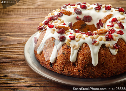 Image of Fruit cake on wooden table