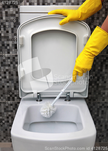 Image of cleaning of toilet bowl 