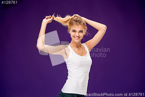 Image of The young woman\'s portrait with happy emotions