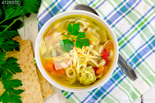 Image of Soup Minestrone in bowl on napkin top