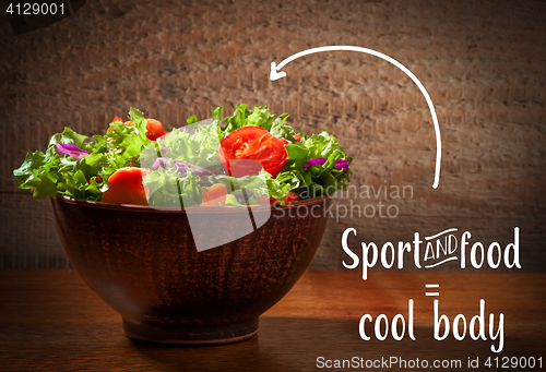 Image of Fresh salade on wooden background