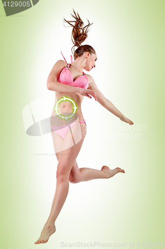 Image of Women belly with the drawing arrows