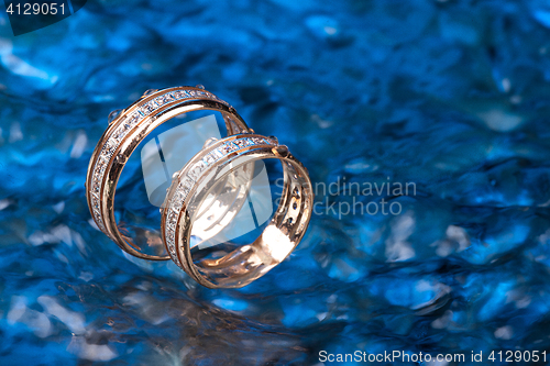 Image of Golden Rings In The Water