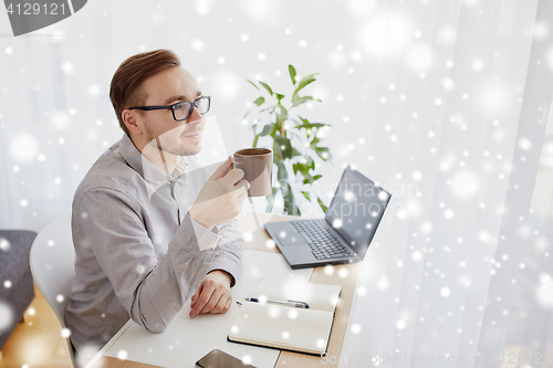 Image of creative man or businessman drinking coffee