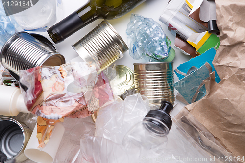 Image of Garbage lies on white table