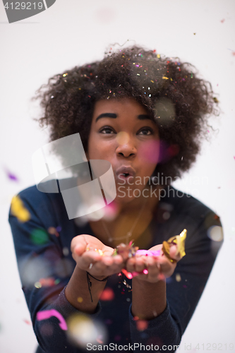 Image of happy young woman celebrating