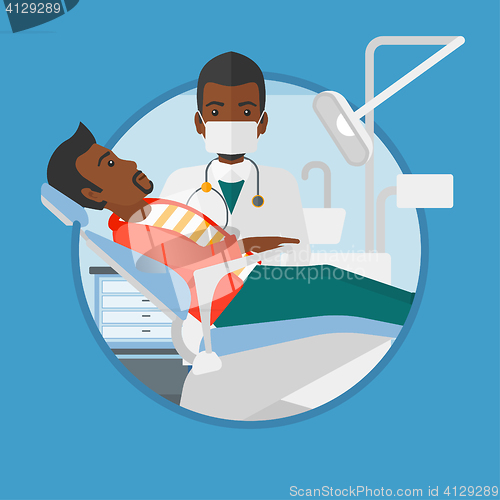Image of Patient and doctor at dentist office.