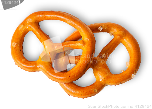 Image of Two crunchy pretzels with salt on each other