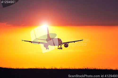 Image of Airplane at the sunset