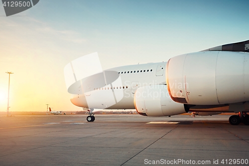 Image of Huge airplane at the sunset