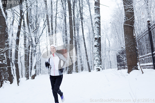 Image of Winter landscape with young woman