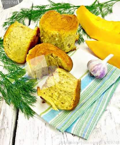 Image of Scones pumpkin with garlic and dill on napkin