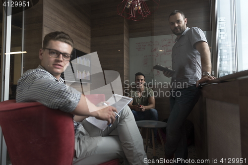 Image of team meeting and brainstorming in small private office