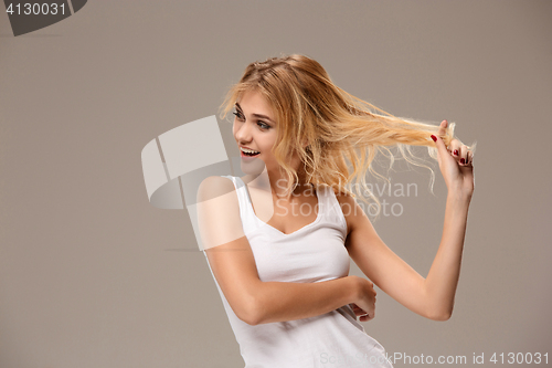 Image of The young woman\'s portrait with happy emotions