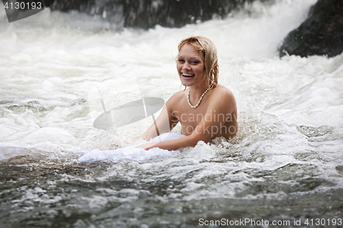 Image of Young Woman Swimming