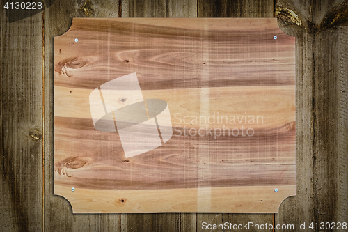 Image of Wooden Nameboard on the Fence