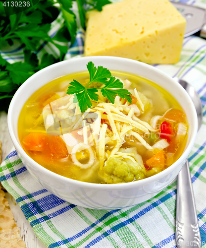 Image of Soup Minestrone in white bowl on light board