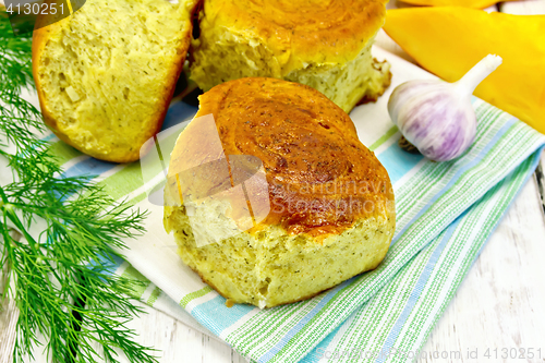 Image of Scones pumpkin with garlic on napkin