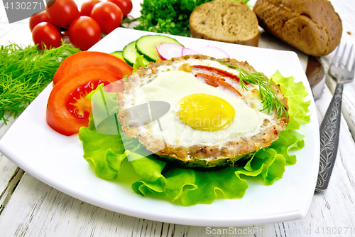 Image of Tartlet meat with egg on light board