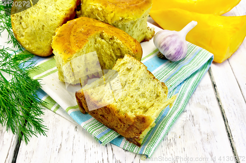 Image of Scones pumpkin with garlic on towel