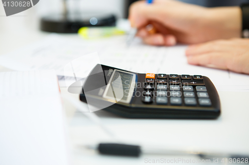 Image of Calculator close up on table