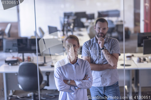 Image of business couple at office