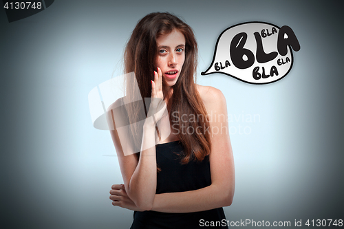 Image of The young woman telling a secret