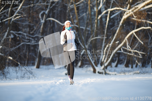 Image of Woman on jogging in winter