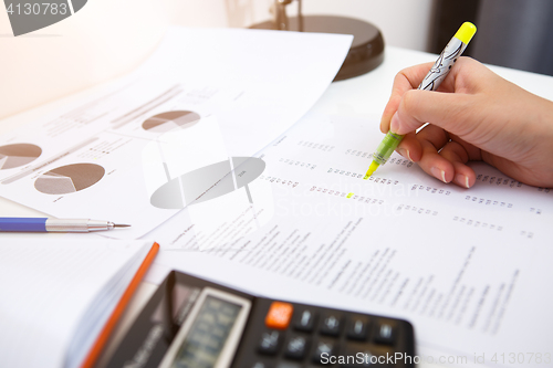 Image of Table of accountant with papers